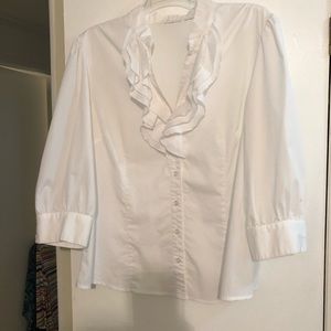 Lovely white blouse with ruffled v-neck.